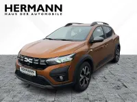 Używany Dacia Sandero Expression 101 KM (74 kW) 2023 Pomarańczowy Hatchback