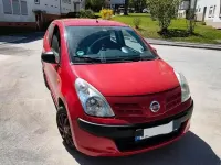 Gebraucht Nissan Pixo 68 PS (50 kW) 2010 Rot Kleinwagen