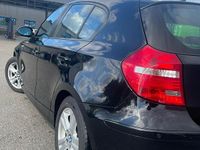 Second-hand BMW 118 143 CP (105 kW) 2009 Negru Hatchback