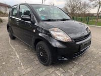 Gebraucht Daihatsu Sirion 91 PS (66 kW) 2011 Schwarz Kleinwagen