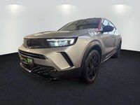 Gebraucht Opel Mokka-e GS Line 100 kW (136 PS) 2022 Kontrast grau/quarz silber SUV