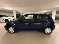 Używany Renault Clio II 58 KM (42 kW) 2006 Brązowy Hatchback
