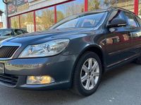 Używany Skoda Octavia 105 KM (77 kW) 2011 Szary Kombi
