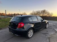Gebraucht BMW 116 122 PS (89 kW) 2009 Schwarz Kleinwagen