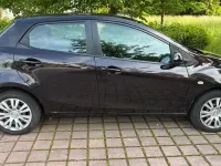 Używany Mazda 2 Dynamic 103 KM (75 kW) 2009 Purpurowy Hatchback