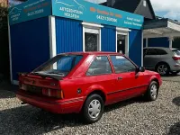 Używany Ford Escort 60 KM (44 kW) 1987 Czerwony Coupe