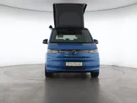 Gebraucht VW T7 Beach 245 PS (180 kW) 2026 Medium blue / deep black perleff Van