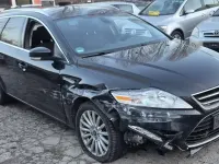Gebraucht Ford Mondeo Titanium 160 PS (117 kW) 2013 Pantherschwarz metallic Kombi