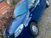 Używany Dacia Sandero 70 KM (51 kW) 2009 Niebieski Sedan/Limuzyna