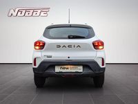 Gebraucht Dacia Spring Extreme 47 kW (65 PS) 2023 Kaolinweiss Kleinwagen