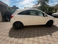 Second-hand Opel Corsa 84 CP (61 kW) 2012 Alb Hatchback