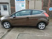 Używany Ford Fiesta Titanium 82 KM (60 kW) 2011 Brązowy Hatchback
