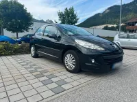 Gebraucht Peugeot 207 73 PS (53 kW) 2010 Schwarz Kleinwagen
