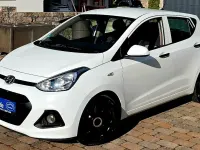 Gebraucht Hyundai i10 67 PS (49 kW) 2014 Weiß Kleinwagen