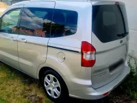 Gebraucht Ford Tourneo Courier 100 PS (73 kW) 2015 Silber Van / Kleinbus
