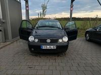 Second-hand VW Polo Basis 64 CP (47 kW) 2003 Roșu Berlinǎ