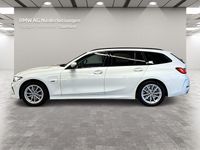 Gebraucht BMW 330e 184 PS (135 kW) 2023 Weiß Kombi