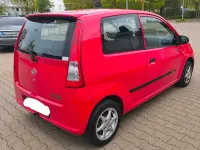 Gebraucht Daihatsu Cuore 58 PS (42 kW) 2005 Rot Kleinwagen