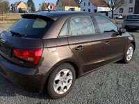 Gebraucht Audi A1 Attraction 105 PS (77 kW) 2012 Braun Kleinwagen