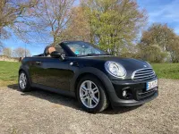 Käytetty Mini Cooper Cabriolet 122 HP (89 kW) 2012 Musta Avoauto