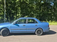 Gebraucht Mitsubishi Carisma 99 PS (72 kW) 1999 Blau Limousine