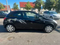 Używany Opel Corsa Edition 80 KM (58 kW) 2008 Czarny Hatchback
