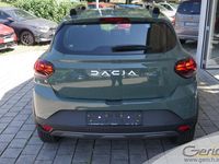 Gebraucht Dacia Sandero Expression 91 PS (66 kW) 2024 Safarigrüngrau metallic Kleinwagen