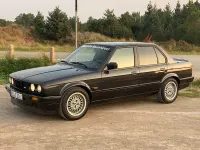 Gebraucht BMW 318 115 PS (84 kW) 1990 Schwarz Limousine