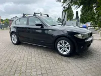 Gebraucht BMW 118 122 PS (89 kW) 2007 Schwarz Kleinwagen