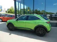 Gebraucht Opel Mokka-e Elegance 100 kW (136 PS) 2024 Grün (matcha green) SUV