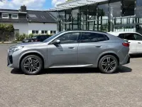 Gebraucht BMW iX2 M Sport 279 kW (380 PS) 2025 Skyscraper grau metallic SUV
