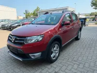 Gebraucht Dacia Sandero Prestige 90 PS (66 kW) 2015 Orange Limousine