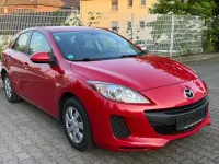 Używany Mazda 3 Active 105 KM (77 kW) 2013 Czerwony Sedan/Limuzyna