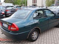 Second-hand Mitsubishi Lancer 75 CP (55 kW) 1998 Verde Berlinǎ
