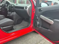 Gebraucht Mazda 2 Independence 75 PS (55 kW) 2009 Rot Kleinwagen