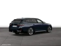 Gebraucht BMW 550e Comfort Edition 489 PS (359 kW) 2025 Carbonschwarz metallic Kombi