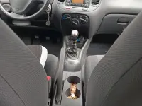 Gebraucht Kia Rio 96 PS (70 kW) 2009 Orange Limousine