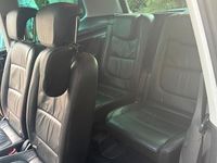 Second-hand VW Sharan 170 CP (125 kW) 2012 Negru Monovolum