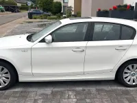 Używany BMW 116 122 KM (89 kW) 2011 Biały Hatchback