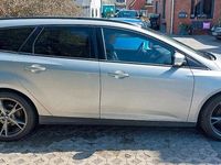 Używany Ford Focus S 125 KM (91 kW) 2014 Srebrny Kombi