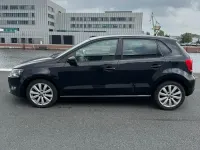 Gebraucht VW Polo Team 95 PS (69 kW) 2011 Schwarz Kleinwagen