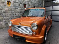 Second-hand Mini 1000 41 CP (30 kW) 1992 Portocaliu Hatchback