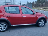 Gebraucht Dacia Sandero Stepway 84 PS (61 kW) 2012 Rot Limousine