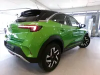 Gebraucht Opel Mokka Elegance 136 PS (100 kW) 2023 Matcha green / dach schwarz SUV