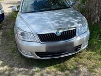 Second-hand Skoda Octavia 105 CP (77 kW) 2012 Argintiu Break