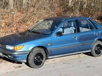 Second-hand Mitsubishi Lancer 97 CP (71 kW) 1990 Albastru Berlinǎ