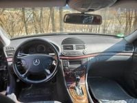 Second-hand Mercedes E230 231 CP (169 kW) 2003 Negru Berlinǎ