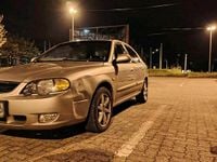 Używany Kia Shuma 101 KM (74 kW) 2003 Złoty Hatchback