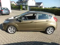 Gebraucht Ford Fiesta Titanium 97 PS (71 kW) 2012 Castanobraun metallic Kleinwagen