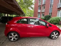 Gebraucht Kia Rio 109 PS (80 kW) 2012 Rot Limousine